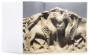 Image from the interior of the exhibition catalog for "Of Earth and Heaven: Art from the Middle Ages" with an image of a stone carving. 
