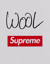 Load image into Gallery viewer, Detail of skateboard with Christopher Wool signature and Supreme logo.
