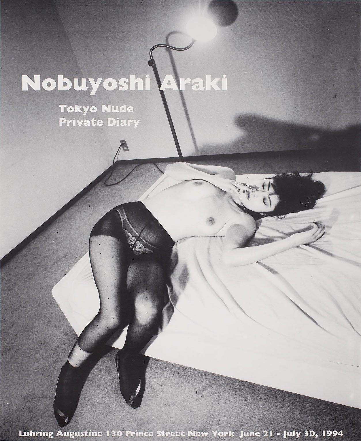 Poster from Nobuyoshi Araki's 1994 exhibition, featuring a photograph of topless woman on a bed in a bare room. 