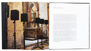 Interior view of Cardiff and Miller publication "The Secret Hotel" with exhibition image and text.