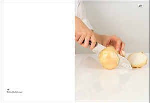Interior of Elad Lassry's "On Onions," with photograph of hand chopping onions.