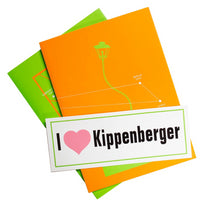 Load image into Gallery viewer, Image of Martin Kippenberger&#39;s &quot;Bermuda Triangle&quot; set, including an &quot;I [heart] Kippenberger&quot; bumper sticker and orange and green posters.