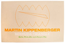 Load image into Gallery viewer, Image of piece from Martin Kippenberger&#39;s &quot;Bermuda Triangle&quot; set, which has the artist&#39;s name, &quot;Bermuda Triangle,&quot; and &quot;Syros, Paris Bar, and Dawson City&quot; written on it.