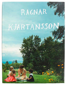 Cover of Ragnar Kjartansson's book "Barbican," with full color image of a family picnicking. 