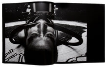 Load image into Gallery viewer, Image of the inside of Yasumasa Morimura&#39;s &quot;No Pain, No Gain&quot; exhibition catalog, with a two-page black and white photograph by the artist.