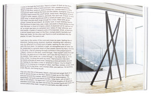Photograph of the interior of Oscar Tuazon's book "Live", with text on the left page and an image of a sculpture by the artist on the right. 